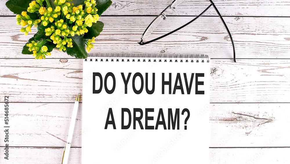 Poster do you have a dream text concept write on notebook on wooden background