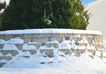 Snow on Curved Block Wall