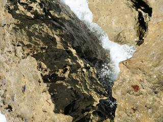 Top View Ocean Seaside Cliff and Splashing Waves