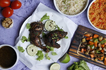Barbecue chicken wings close up on wooden tray, shot with selective focus