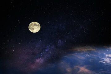 big moon on  night  blue starry sky  dramatic clouds  nebula and milky way  universe space 