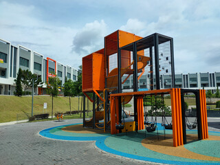 PENANG, MALAYSIA -MAY 8, 2022: Selected focused on modern children's outdoor playground in the...
