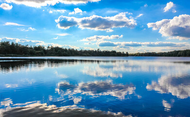 Obraz premium North German Stoteler See Lake blue water with cloud reflection