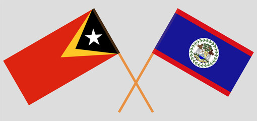 Crossed flags of East Timor and Belize. Official colors. Correct proportion
