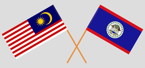Crossed flags of Malaysia and Belize. Official colors. Correct proportion