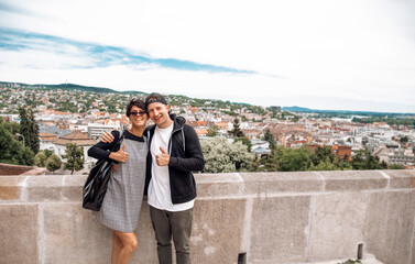 couple looking at the city. Travel couple. Vacation. Big city background. Happy day. Love. Photo. 