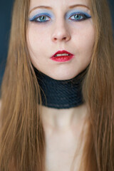 Indoor portrait of young beautiful woman.