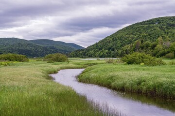 Looking east along Margaree River in Inverness County of Nova Scotia, Canada