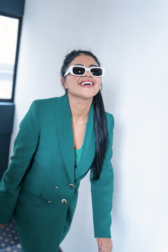 smiling latin young woman wear sunglasses and blaze , fashion, beauty and lifestyle