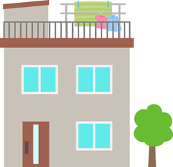 屋上に洗濯物を干している戸建て住宅