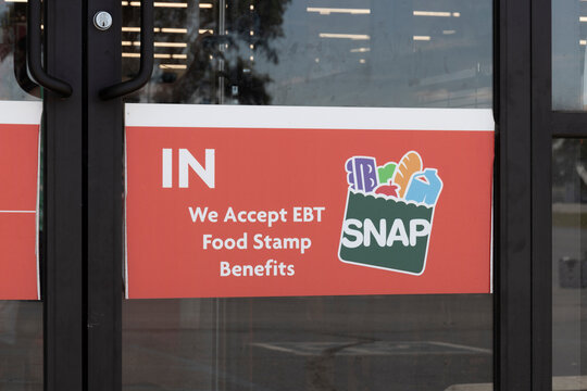 SNAP And EBT Accepted Here Sign. SNAP And Food Stamps Provide Nutrition Benefits To Supplement The Budgets Of Disadvantaged Families.