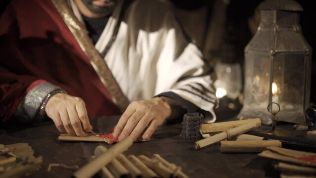 Communication of the Byzantine Empire in the Middle Ages.
The Byzantine Emperor unseals the letter on his desk and reads it.
