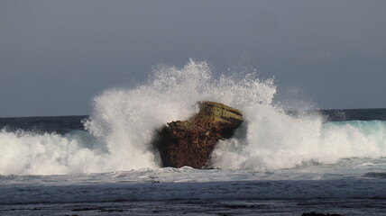 waves crashing on the beach