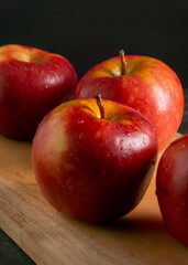 Apples in a dramatic low key concept with a dark background in variety angles for multipurpose