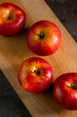 Apples in a dramatic low key concept with a dark background in variety angles for multipurpose
