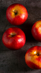 Apples in a dramatic low key concept with a dark background in variety angles for multipurpose