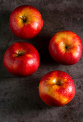 Apples in a dramatic low key concept with a dark background in variety angles for multipurpose