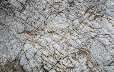 The many patterns on the large rocks, naturally occurring