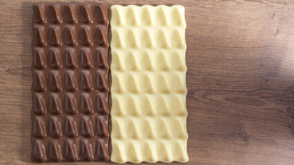 white chocolate and milk chocolate or dark chocolate concept background with delicious and creamy quality
