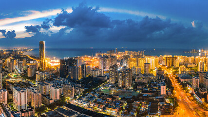 Fototapeta na wymiar Aerial Night View of Haikou Port, the Main Transportation Hub for Haikou City, Hainan Free Trade Zone of China, Asia.