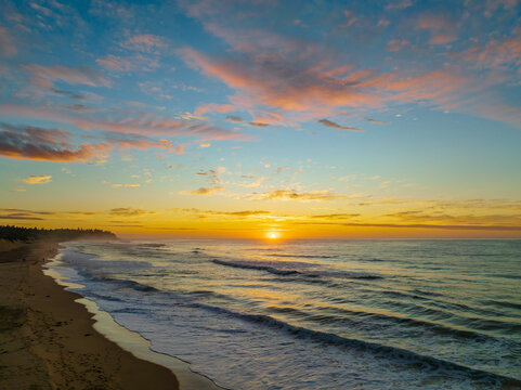 Aerial sunrise seascape with  high cloud