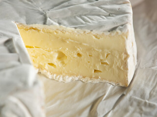 types of cheese on wooden table