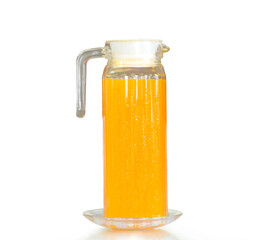 Fresh orange juice in tall jug isolated on white background with clipping path