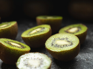 kiwi fruit on a black background