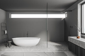 Grey bathroom interior tub with douche and accessories, panoramic window