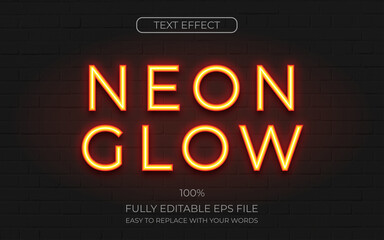 Fototapeta premium Neon text effect shades of orange on brick background