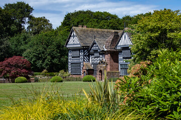 Fototapeta na wymiar Speke Hall, a wood-framed wattle-and-daub Tudor manor house in Speke, Liverpool in northwest England. It is one of the finest surviving examples of its kind. Dates from 1530.