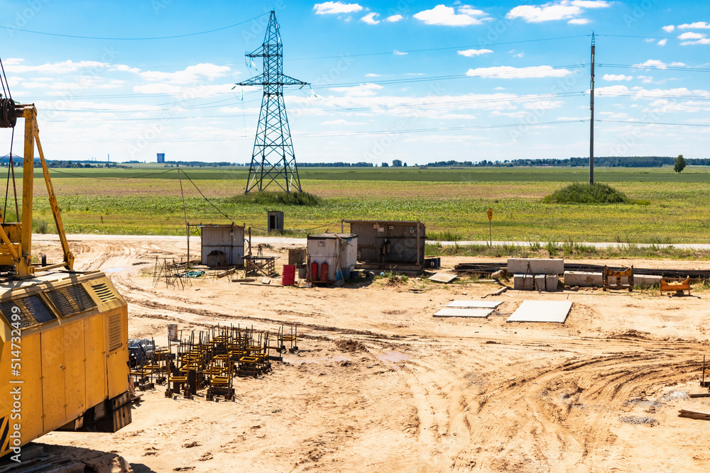 Poster building materials at a construction site. prepared materials and embedded parts for foundations at 