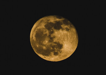 The full moon hanging in the sky over Orwell, Ohio