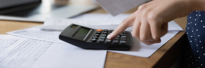 Accounting professional woman counting money, expenses, fees, analyzing bills, financial reports,...
