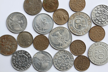 Various Indonesian 1950's old coins, 25 cents Rupiah and 50 cents Rupiah.