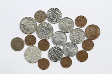 Various Indonesian 1950s old coins, 25 cents Rupiah and 50 cents Rupiah.
