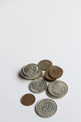 Pile of Indonesian 1950s old coins 25 cents Rupiah and 50 cents Rupiah.