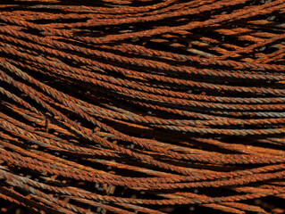Rusty textured metal, rusty wire, abstract background for creative design. Rusty metal waste.Selective focus.