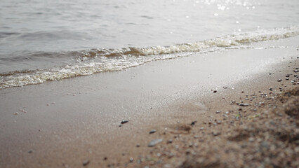 closeup shot of waves rolling on a beach on Baltic Sea