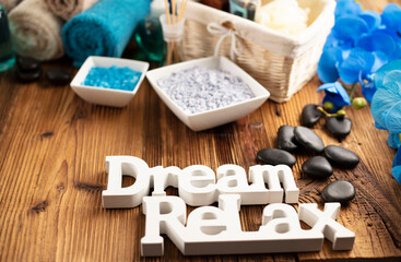 Spa accessories on wooden paneling. Spa treatments.