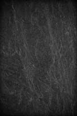Dark grey black slate background or texture.