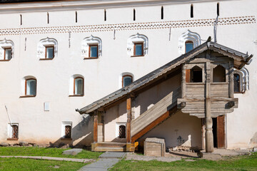 Wooden porch of an ancient building (XV-XVII centuries). Fragment of the Archbishop's Palace in the Kremlin of Veliky Novgorod. Russia