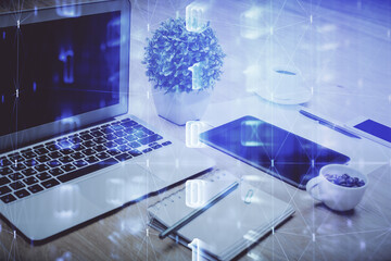 Double exposure of table with computer on background and data theme drawing. Concept of innovation.