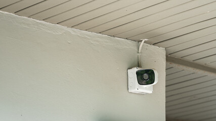 A security wireless camera which is installed at ceiling, using to monitor around the area....