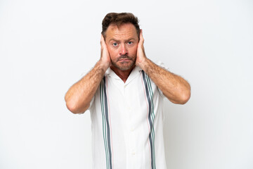 Middle age caucasian man isolated on white background frustrated and covering ears