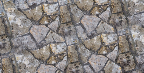 texture urban square stacked of stone tiles closeup with lines