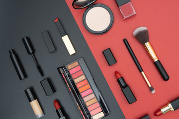 set decorative cosmetics on black and red