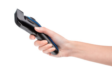 A woman's hand holds a hair clipper. Trimmer. The hairdresser