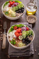 Fresh Greek salad in the fit version with buckwheat groats.