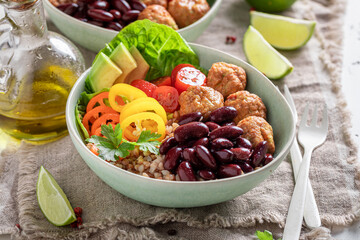 Energetic Mexican salad as meal with meat and groats.